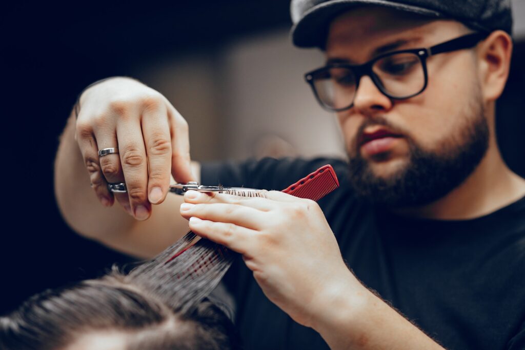 stylish man sitting in a barbershop 1